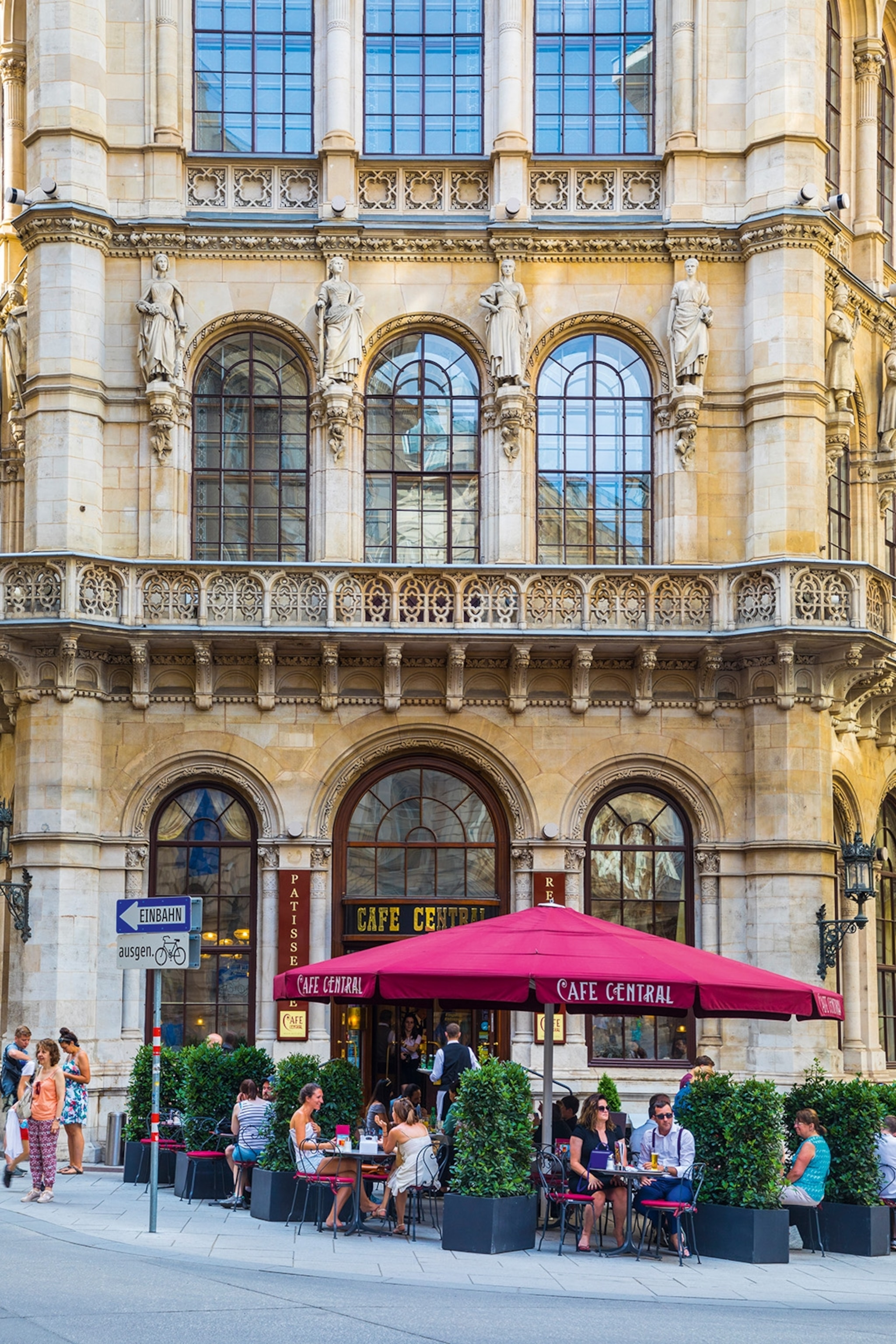 Guests enjoy the outdoor seating at Cafe Central in Vienna.