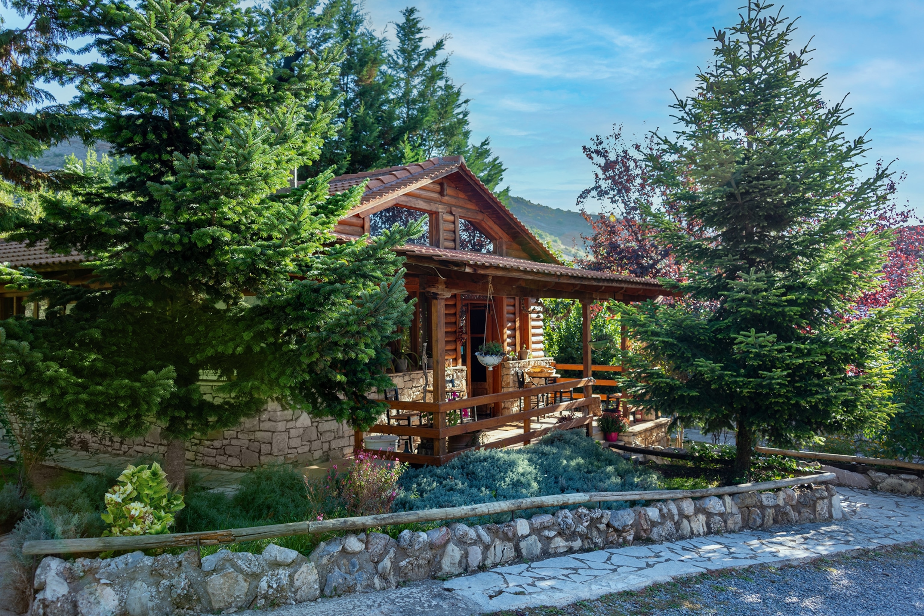 Orias Mountain Guesthouse & Farm is tucked away in greenery within the Helmos Mountains.